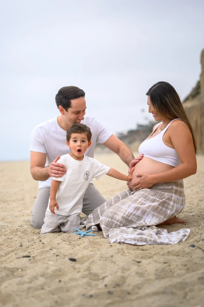 Candid lifestyle family and maternity portraiture in San Marcos, capturing honest interactions and laughter.