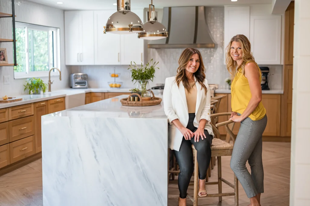 Interior design team collaborating on a luxury kitchen project in San Diego.
